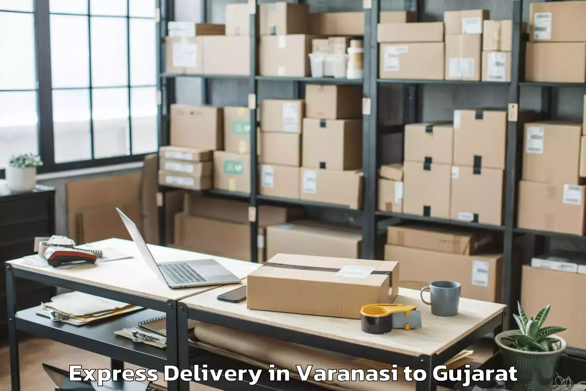 Book Your Varanasi to Saurashtra University Rajkot Express Delivery Today